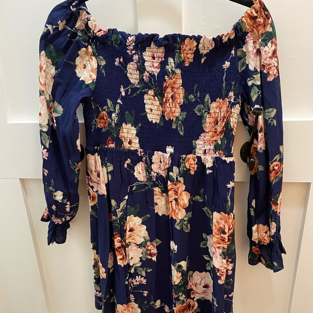 Off shoulder navy floral top with smocked bodice